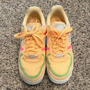 Nike Air Force 1. Colorful Sneakers with Orange and Green Accents